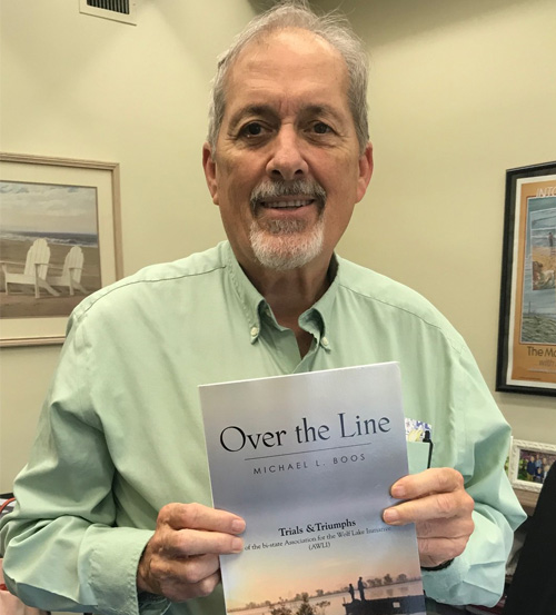 Michael showing Book