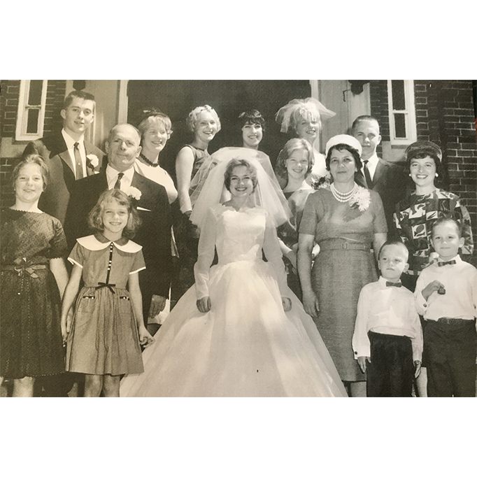 From left, front row: Jana, Nancy, Mary Jo, David, Doug. Second row: Dad, Cecilia, Mom, Theresa. Back row: Michael, Dolores, Patricia, Mercedes, Virginia, Loras.